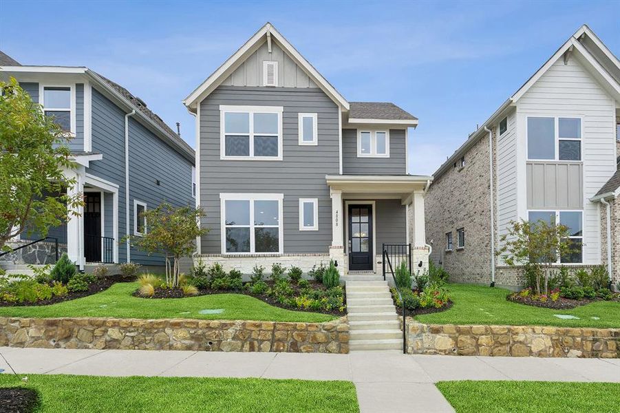 Front exterior of a new home in Painted Tree Woodland West – Cottages, McKinney, TX, highlighting curb appeal (Image 2).