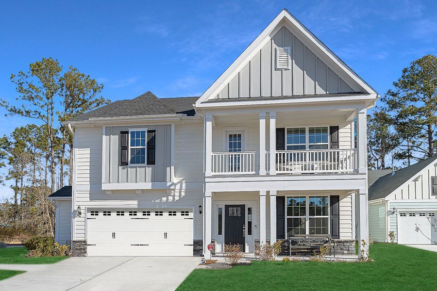 Representative exterior photo of a completed home built from the Palmer - Vanguard Collection by Mungo Homes in Georgias Landing, Raleigh, NC (Image 28).