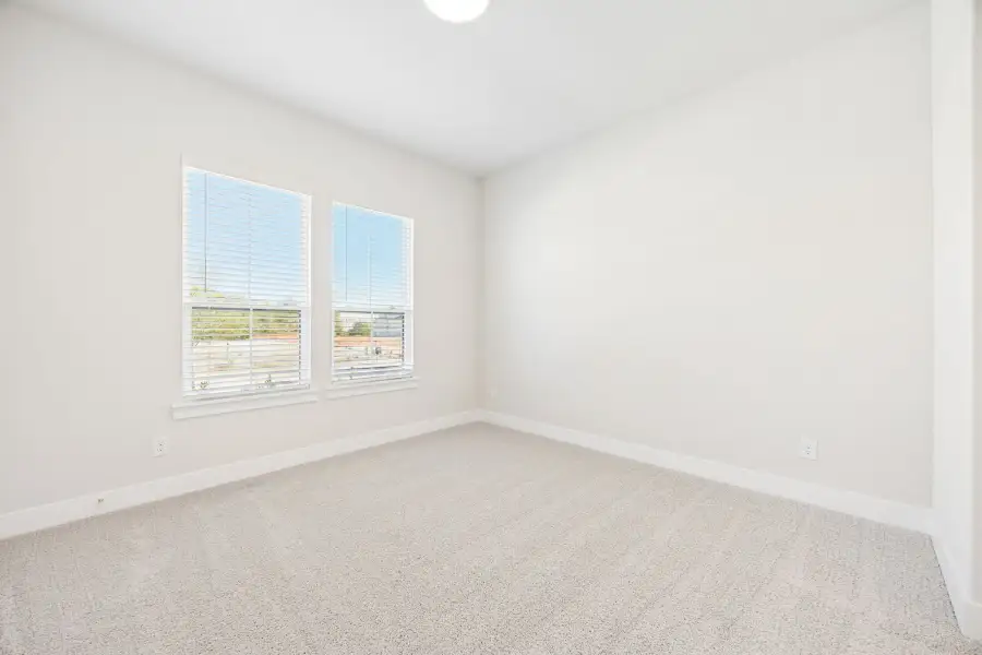 Spacious, unfurnished interior of a new home in Rainwater Crossing, Celina (Image 31).