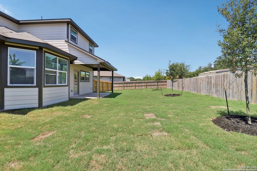 Exterior details and patio area of a home in Thomas Pond, San Antonio (Image 30). Exterior details and patio area of a home in Thomas Pond, San Antonio (Image 30).