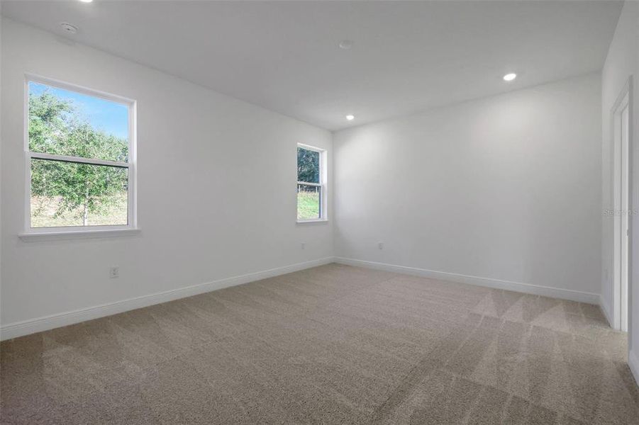 Spacious, unfurnished interior of a new home in Crossroads at Kelly Park, Apopka (Image 28). Spacious, unfurnished interior of a new home in Crossroads at Kelly Park, Apopka (Image 28).