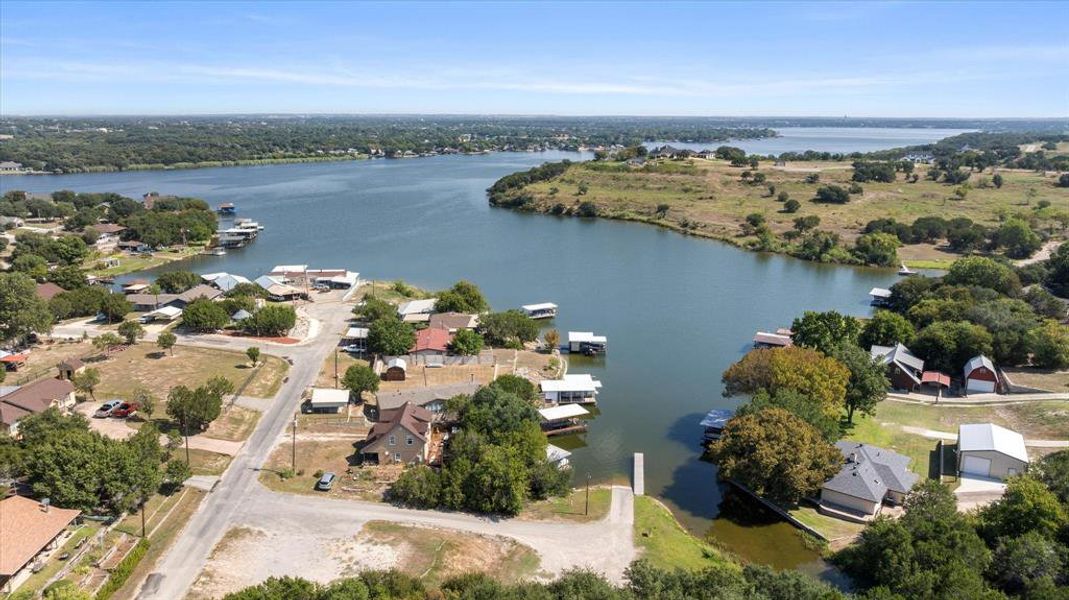 Aerial view of residential area with a large body of water Aerial view of residential area with a large body of water