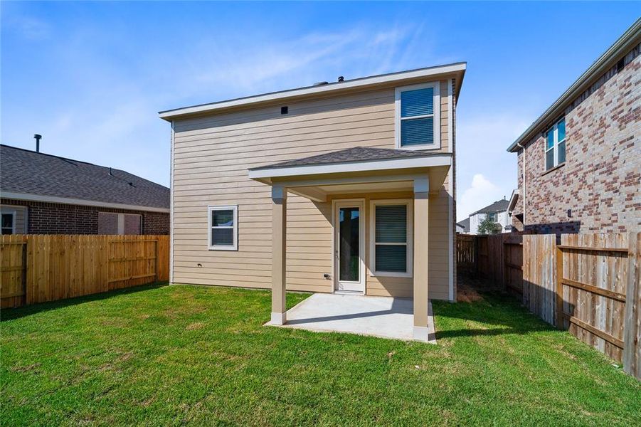 Come and see this spacious backyard with its beautiful covered patio. There is plenty of room for the kids to play and adults to relax! Perfect for your outdoor living space, patio furniture, bbq pit, and so much more. The possibilities are endless!