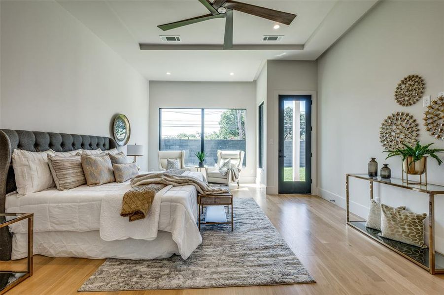 Bedroom featuring light hardwood / wood-style flooring and ceiling fan