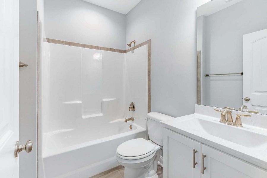 Representative furnished interior of a home built from the Garland by Caviness & Cates Communities in Bartlett Manor, Youngsville (Image 248). Representative furnished interior of a home built from the Garland by Caviness & Cates Communities in Bartlett Manor, Youngsville (Image 248).