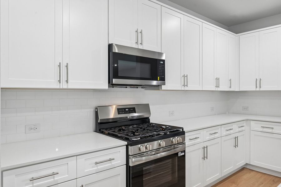 Kitchen in the Hayden home plan by Trophy Signature Homes