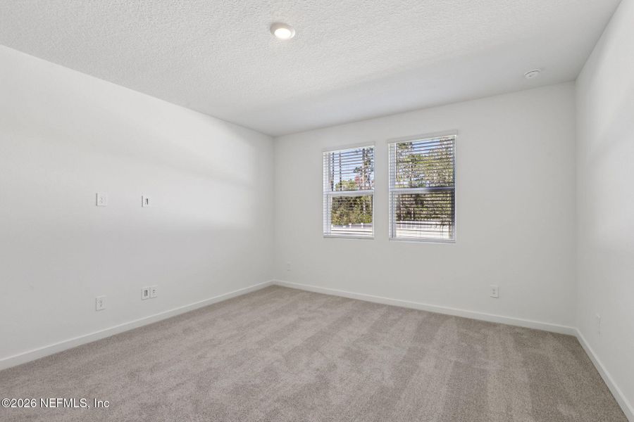 Spacious, unfurnished interior of a new home in Cypress Meadows - Signature Series, Jacksonville (Image 20).