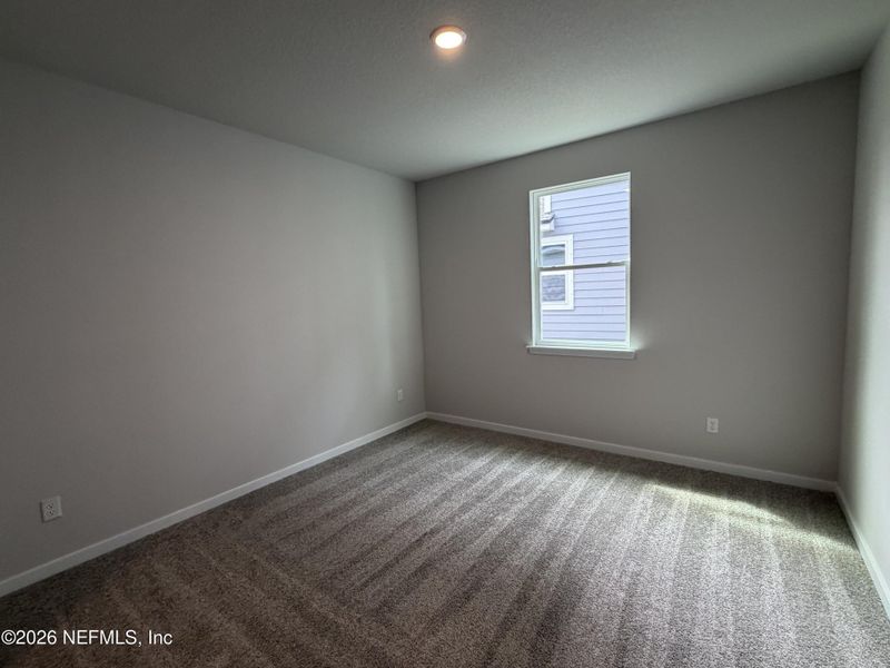 Spacious, unfurnished interior of a new home in Reserve East, Flagler Beach (Image 25).