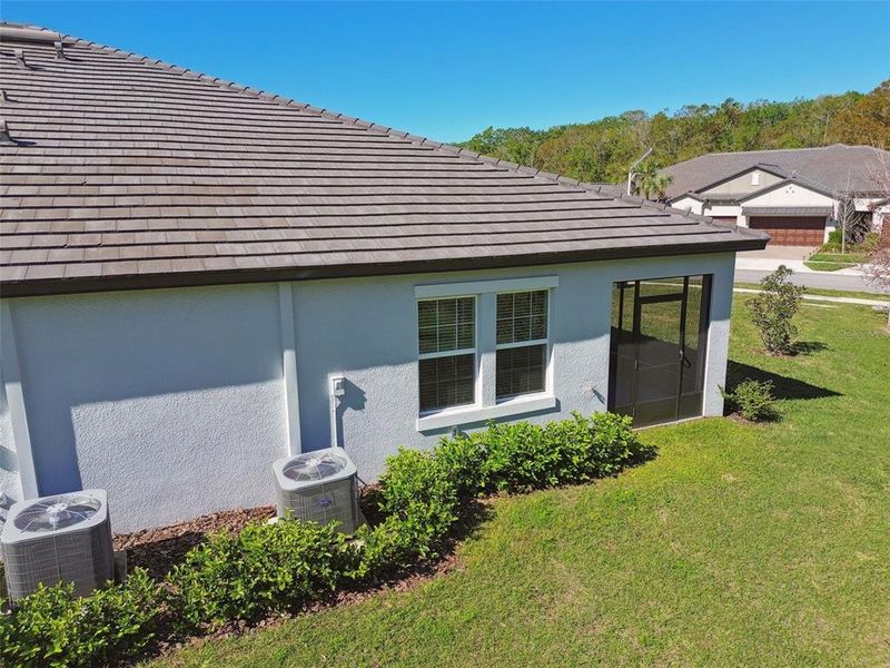 Front exterior of a new home in Angeline Active Adult, Land O' Lakes, FL, highlighting curb appeal (Image 29).