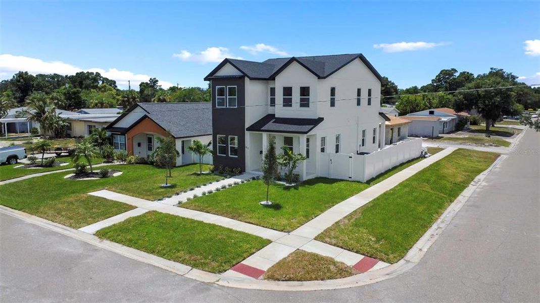 Front exterior of a new home in , St. Petersburg, FL, highlighting curb appeal (Image 2). Front exterior of a new home in , St. Petersburg, FL, highlighting curb appeal (Image 2).