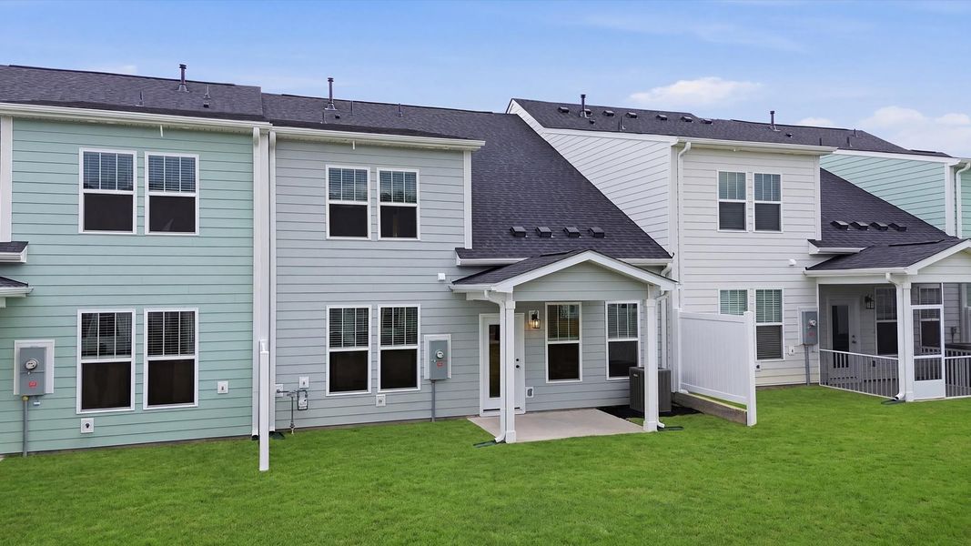Established charm meets functional outdoor living with a spacious rear covered porch by DRB Homes Established charm meets functional outdoor living with a spacious rear covered porch by DRB Homes