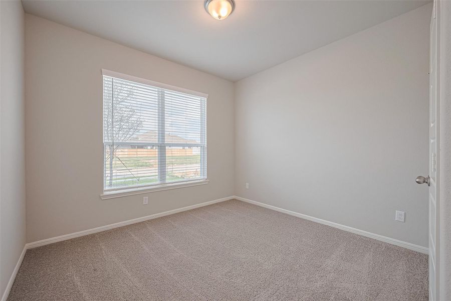 Spacious, unfurnished interior of a new home in Sunterra, Katy (Image 12).