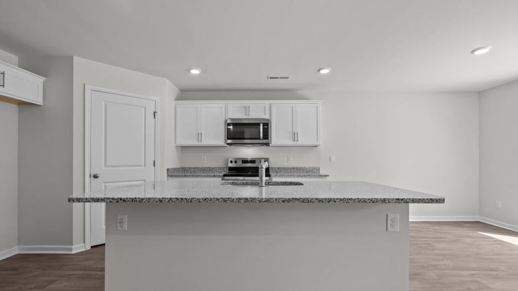 Furnished interior view inside a new home in Blair Ridge, La Grange (Image 5).