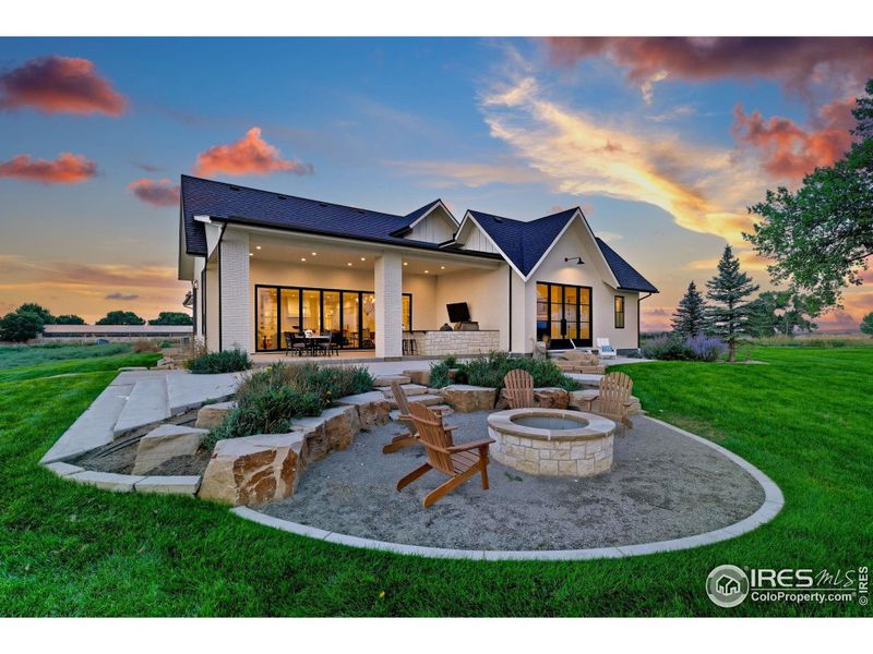 Front exterior of a new home in , Longmont, CO, highlighting curb appeal (Image 20).