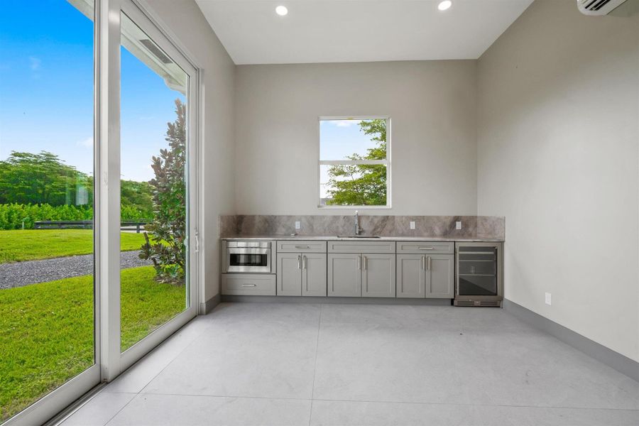 Exterior details and patio area of a home in , Wellington (Image 29). Exterior details and patio area of a home in , Wellington (Image 29).
