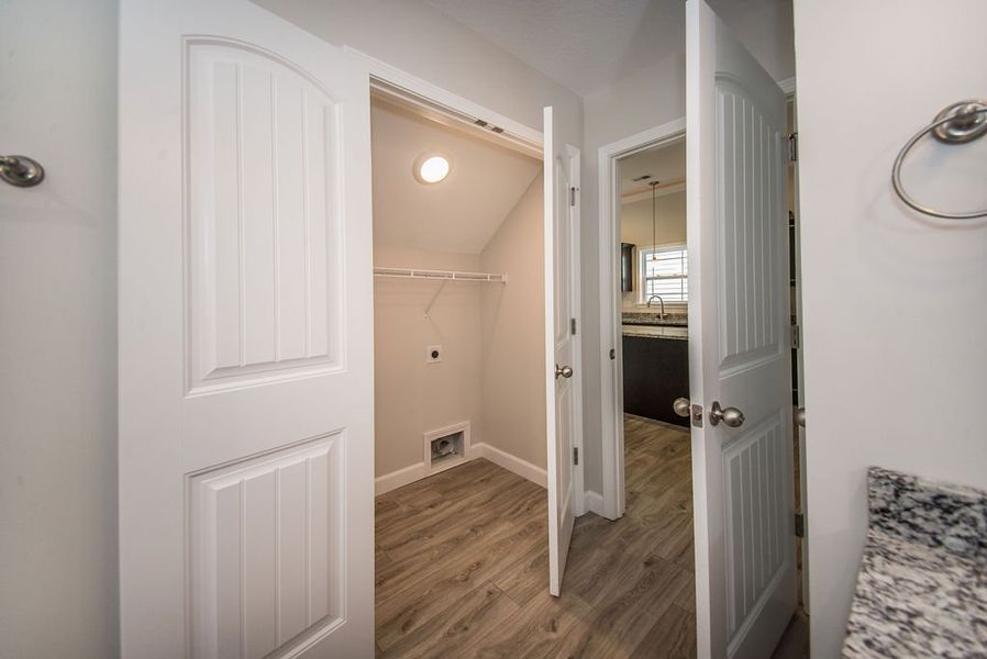 Representative unfurnished interior of a home built from the Quincy by Enchanted Homes in Lonesome Dove, San Antonio (Image 25).