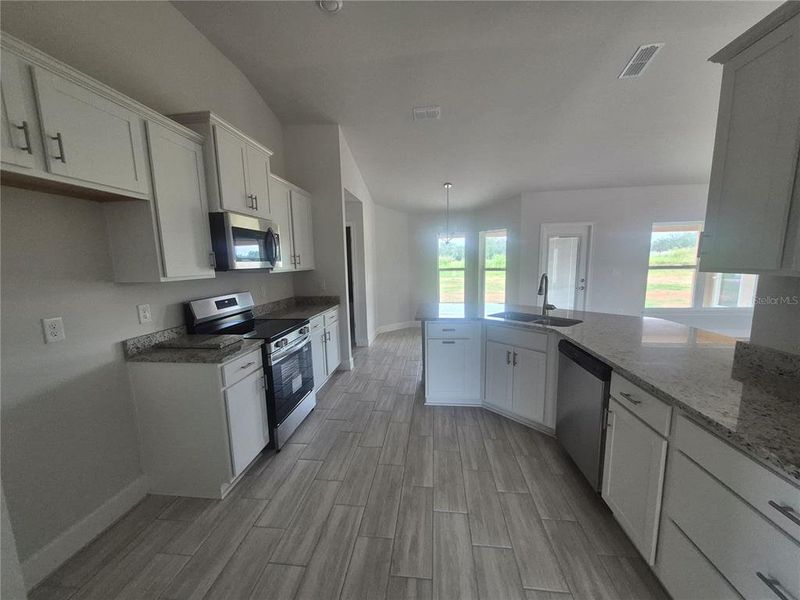 Furnished interior view inside a new home in Hill Country Estates, Dade City (Image 9). Furnished interior view inside a new home in Hill Country Estates, Dade City (Image 9).