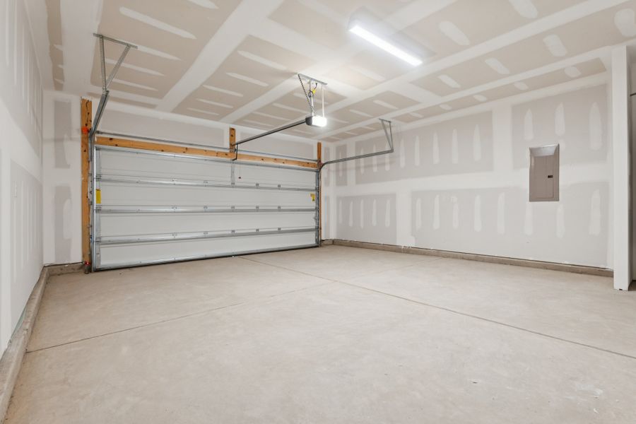 A room with a staircase. A room with a staircase.