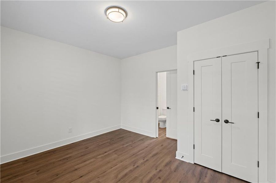 Spacious, unfurnished interior of a new home in Devin's Shire - A Kennesaw Tradition, Kennesaw (Image 26).