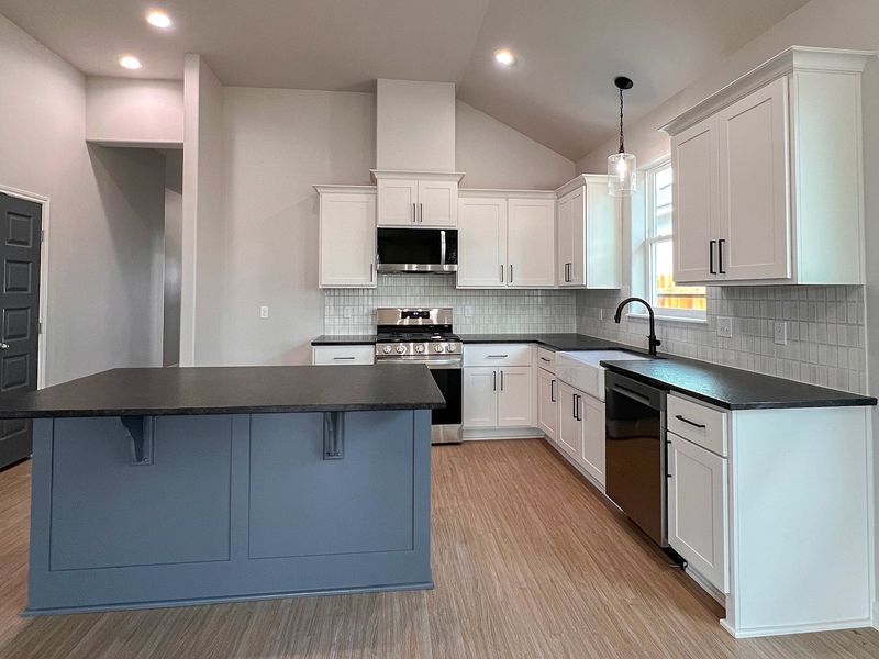 Furnished interior view inside a new home in TerraVista, Victoria (Image 6).