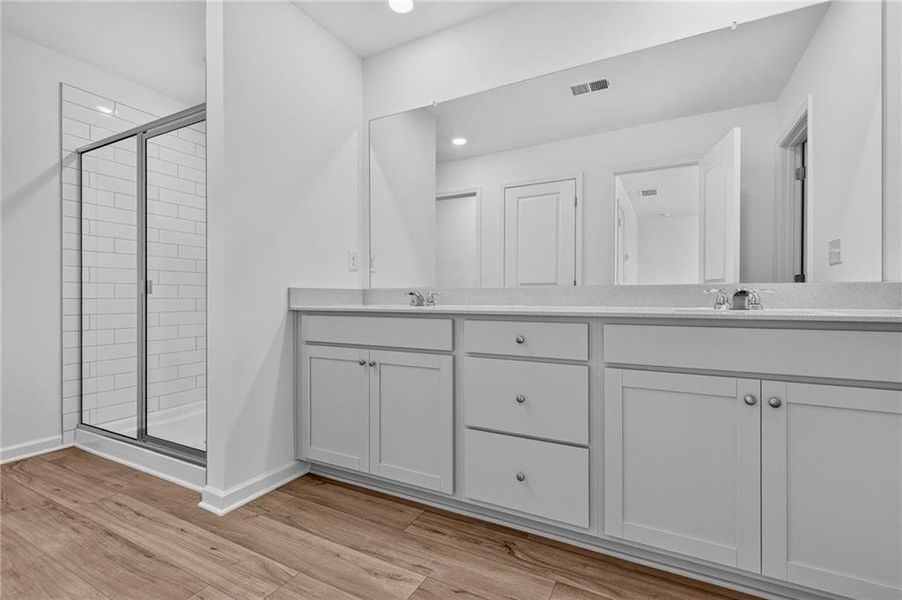 Furnished interior view inside a new home in Towns at Holly Springs, Holly Springs (Image 7). Furnished interior view inside a new home in Towns at Holly Springs, Holly Springs (Image 7).