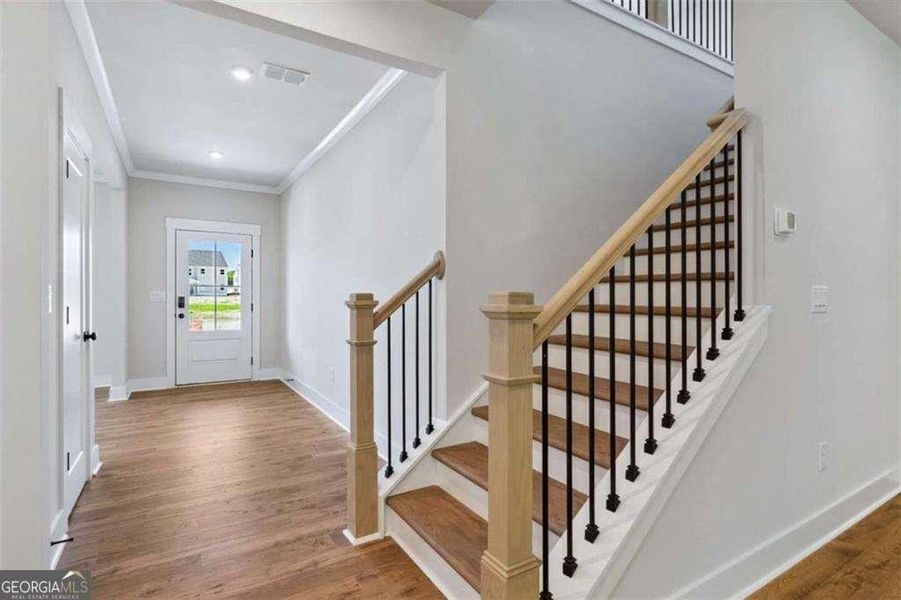 Spacious, unfurnished interior of a new home in The Paddocks at Doc Hughes, Buford (Image 25).