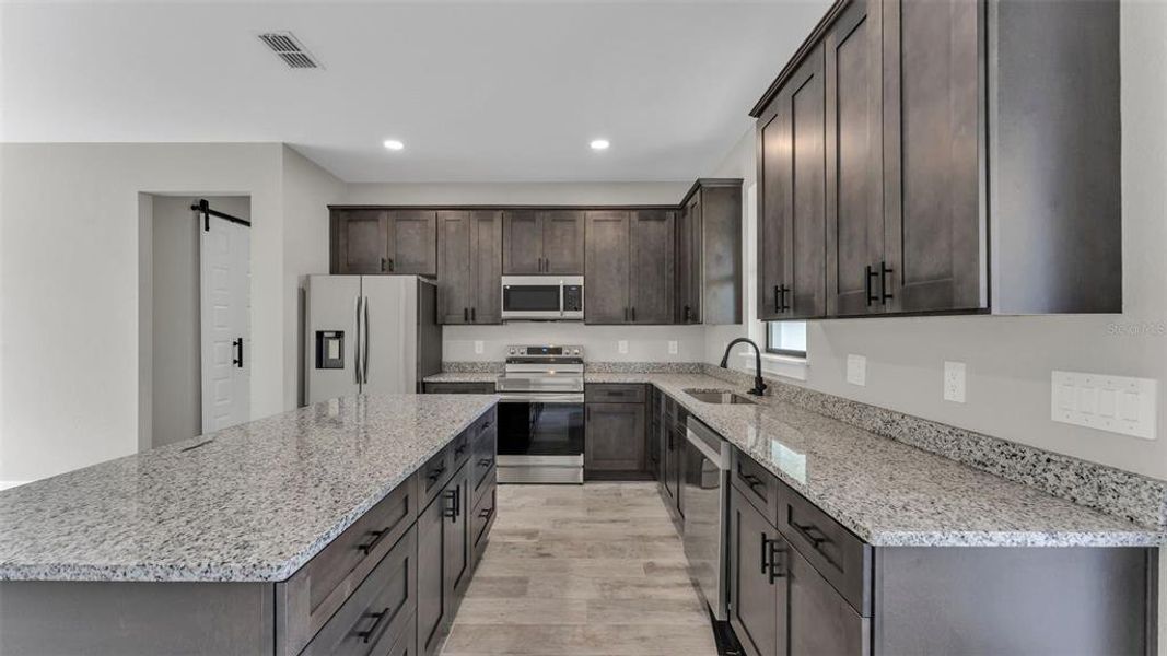 Furnished interior view inside a new home in , Winter Haven (Image 12). Furnished interior view inside a new home in , Winter Haven (Image 12).