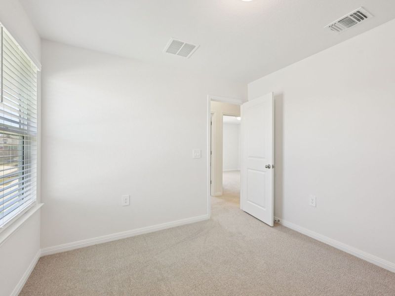 Spacious, unfurnished interior of a new home in Lexington Parke, Del Valle (Image 14).