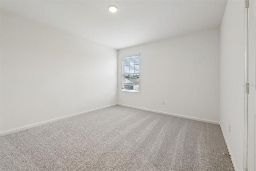 Spacious, unfurnished interior of a new home in Pelham Square, Deland (Image 25).