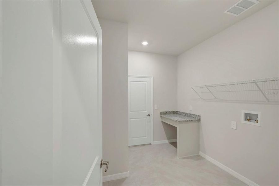 Spacious, unfurnished interior of a new home in Gracewater at Sarasota, Sarasota (Image 12).