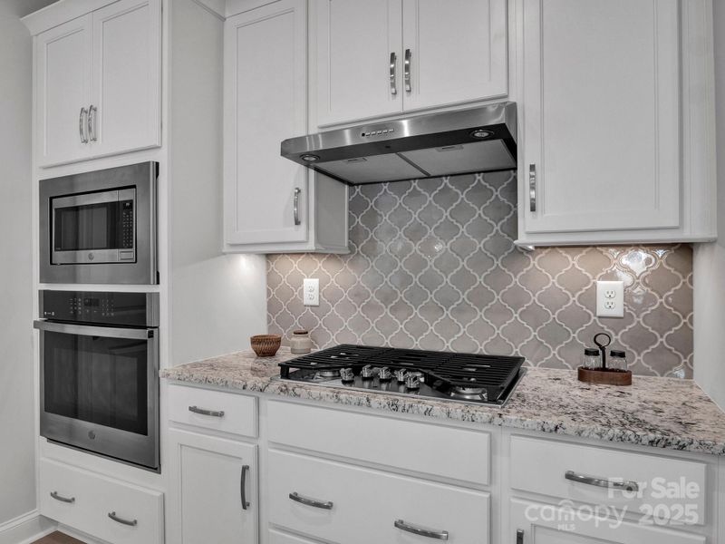 30" Gas Cooktop/ Wall Oven and Range Hood. Under Cabinet Lighting.