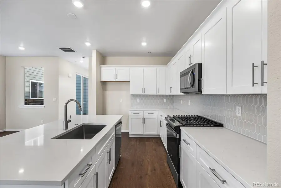 Furnished interior view inside a new home in Barefoot Village, Firestone (Image 10).