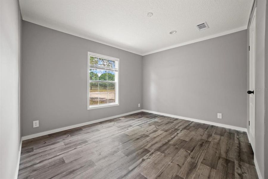 Spacious, unfurnished interior of a new home in , Okeechobee (Image 10).