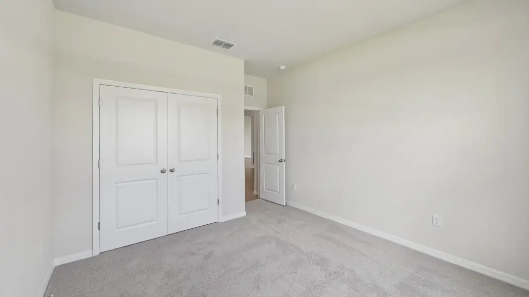 Spacious, unfurnished interior of a new home in Oakfield Trails, Parrish (Image 21).