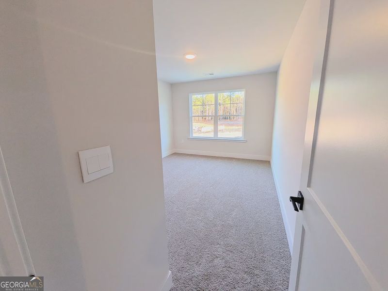 Spacious, unfurnished interior of a new home in Canterbury Villas, Carrollton (Image 22).