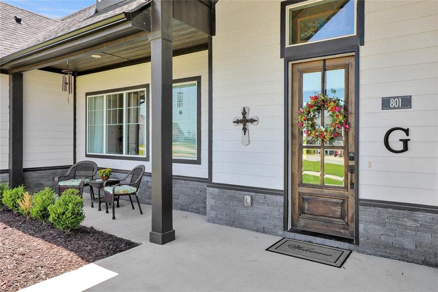 Doorway to property with covered porch Doorway to property with covered porch