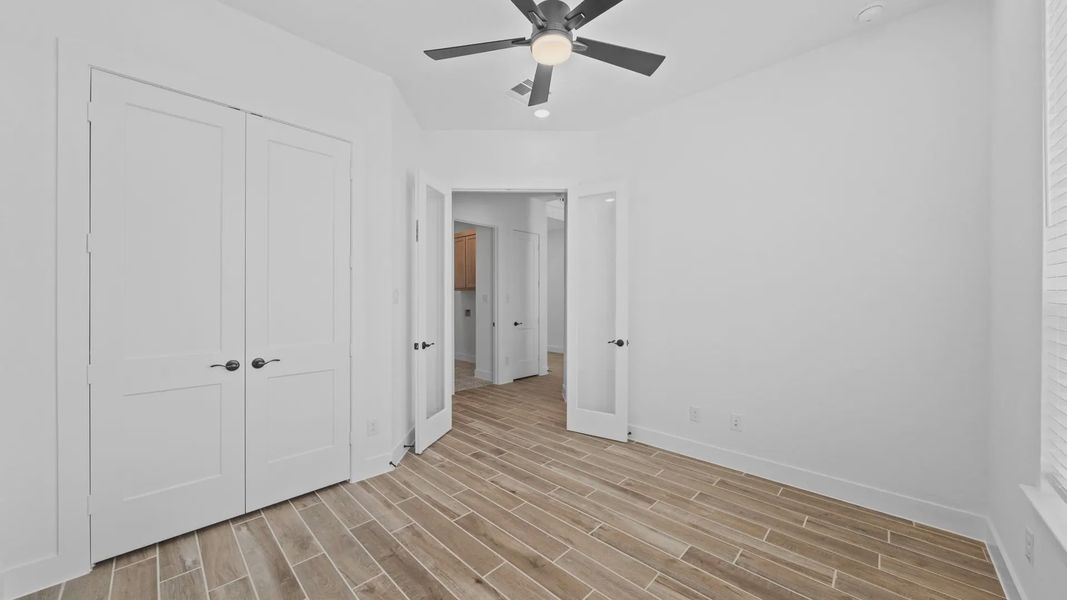 Representative unfurnished interior of a home built from the Rivers by Chesmar Homes in Sofi Lakes, Katy (Image 28).
