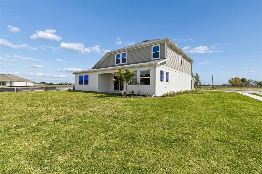 Exterior details and patio area of a home in Coasterra, Palmetto (Image 21).