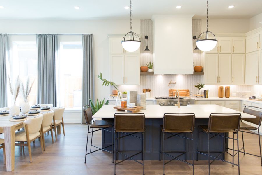 Representative furnished interior of a home built from the 6011 by Tradition Homes in Mustang Lakes, McKinney (Image 23).