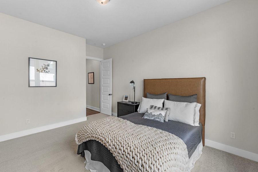 Furnished interior view inside a new home in Bridgeland, Cypress (Image 32).