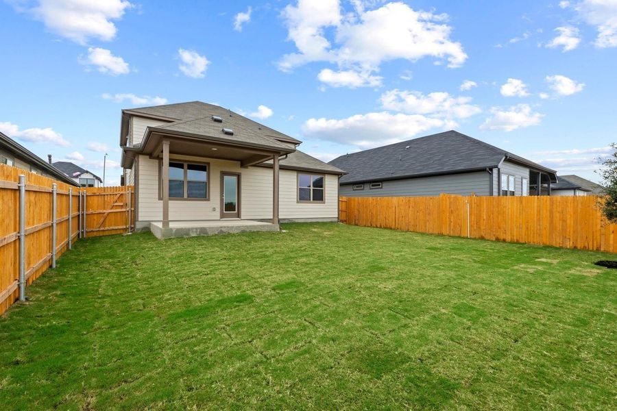 Exterior details and patio area of a home in Prairie Winds, Hutto (Image 22).
