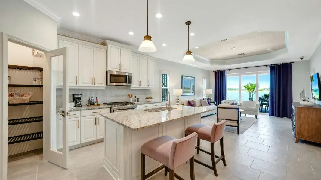 Furnished interior view inside a new home in Kingston South Real Estate and Homes for Sale in Estero, FL - Neal Communities, Estero (Image 12).
