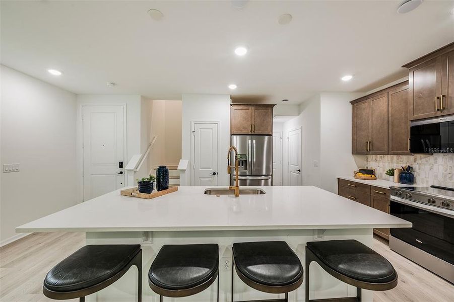 Furnished interior view inside a new home in Towns at Greenleaf, Oviedo (Image 6).