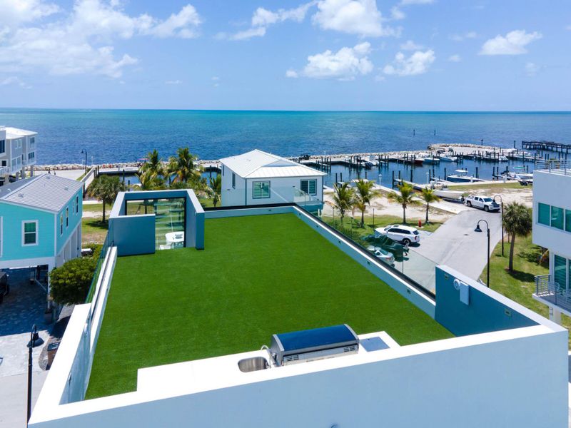 Front exterior of a new home in , Key Largo, FL, highlighting curb appeal (Image 23).