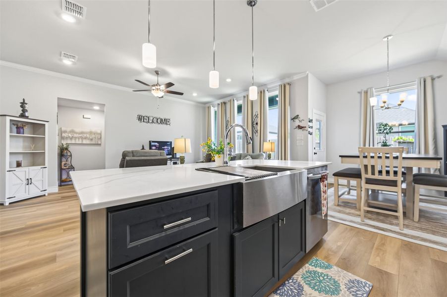 Bright, airy kitchen featuring quartz countertops, high-end stainless steel appliances, and an inviting, open-concept design perfect for daily living and entertaining. Bright, airy kitchen featuring quartz countertops, high-end stainless steel appliances, and an inviting, open-concept design perfect for daily living and entertaining.