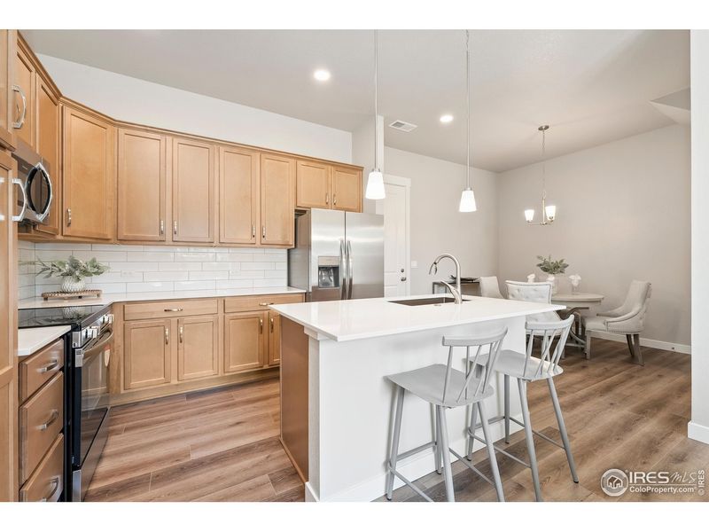 Furnished interior view inside a new home in The Lakes at Centerra - Discovery, Loveland (Image 5).