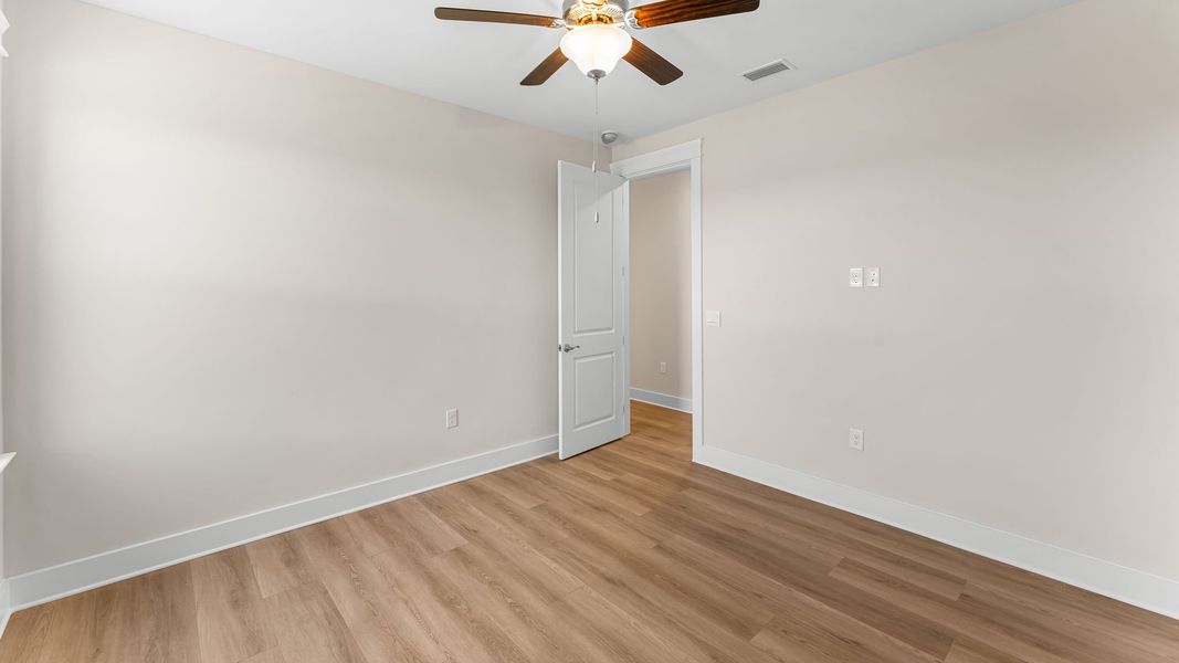 Representative unfurnished interior of a home built from the The Islamorada by D.R. Horton in WindMark Beach, Port Saint Joe (Image 26).
