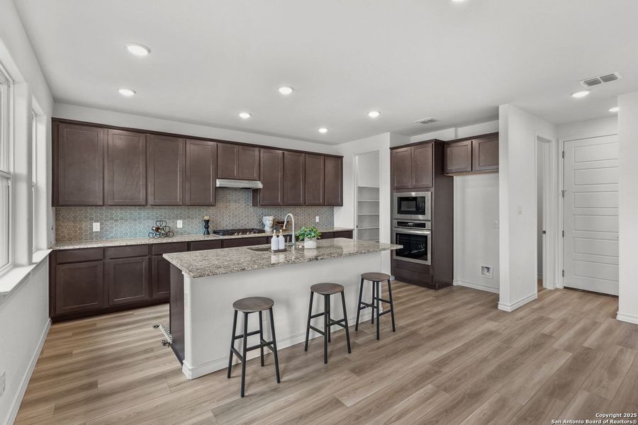 Furnished interior view inside a new home in Ladera, San Antonio (Image 16).