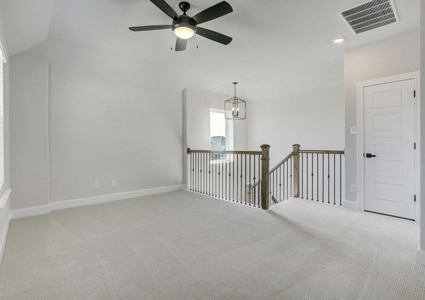 Upstairs game room creates a space for your kids to hangout.