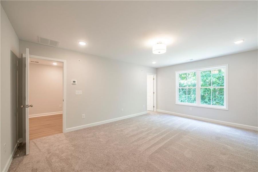 Spacious, unfurnished interior of a new home in River Walk Place, Lawrenceville (Image 29).